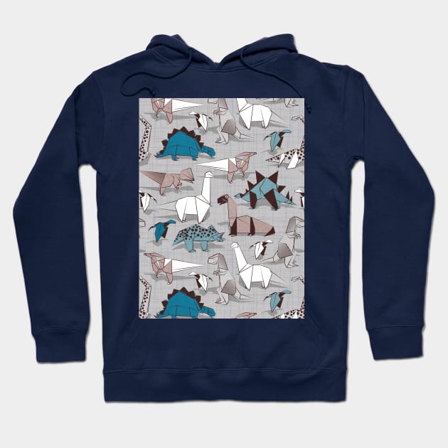 Origami dino friends // pattern // grey linen texture background blue white and beige dinosaurs Hoodie by SelmaCardoso